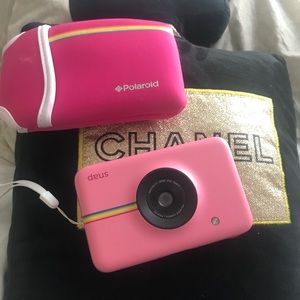 pink Polaroid camera with case